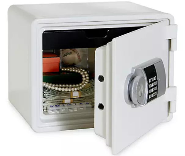 Interior view of UC-1958E safe showing storage tray and programmable codes